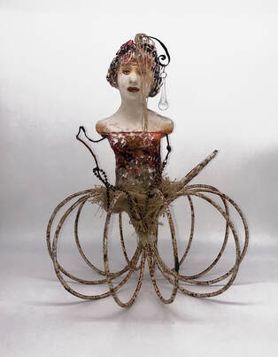 Sculptural ceramic figures assembled with found objects by Alicia Tapp
