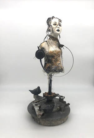 Sculptural ceramic figures steampunk and street art inspired  assembled with found objects by Alicia Tapp