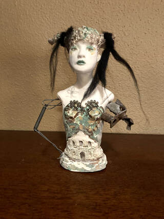 San Antonio Texas inspired figurative sculpture with found objects, assembled art
